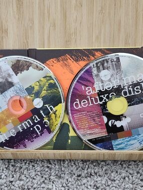 Aftermath Deluxe Disc CD Set - Multicolor